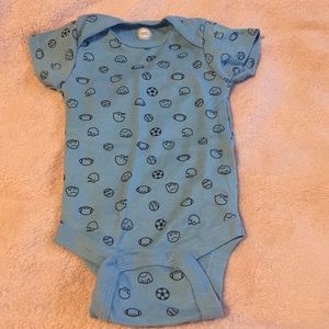 Newborn Size Blue Onesie With different Sports
